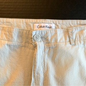 CALVIN KLEIN. Cream Twill Pants, flat front w/ two pockets and two back …